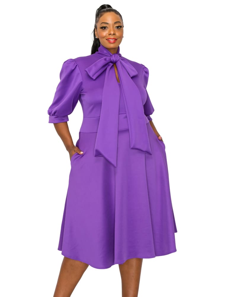 Front of a model wearing a size 2X Casey Scuba Flare Dress in Purple by L I V D. | dia_product_style_image_id:300482